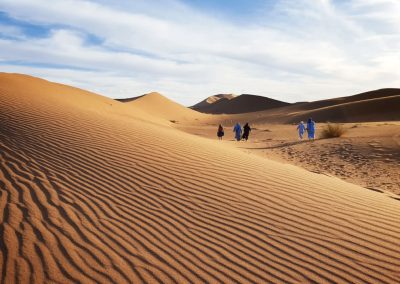 Walking barefoot across the dunes